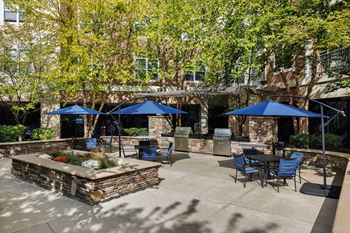 Outdoor lounge with community grills